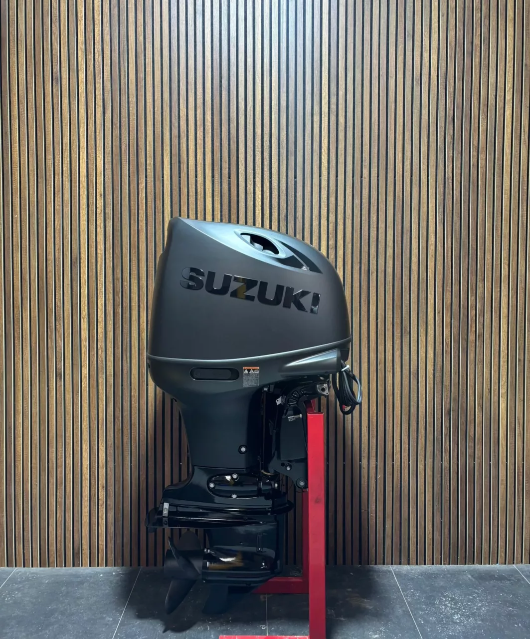 2024 Suzuki 140 HP EFI Stealth Line outboard engine.