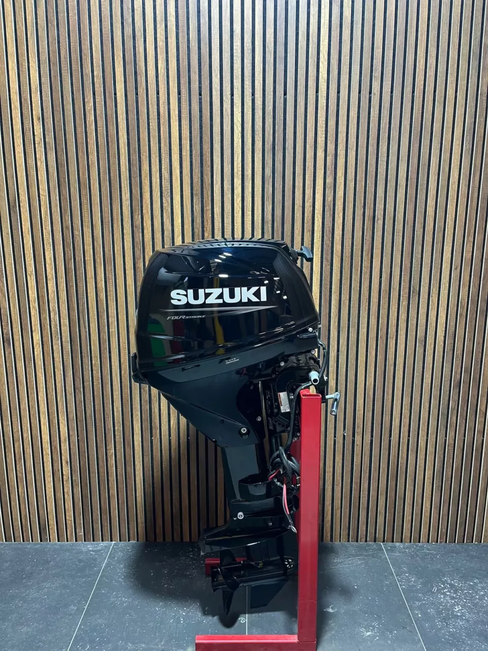 Suzuki 30 HP EFI outboard engine.