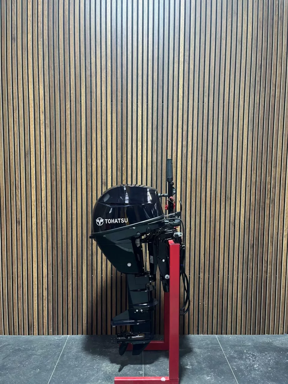 Tohatsu 9.9 HP EFI Powertilt outboard engine.